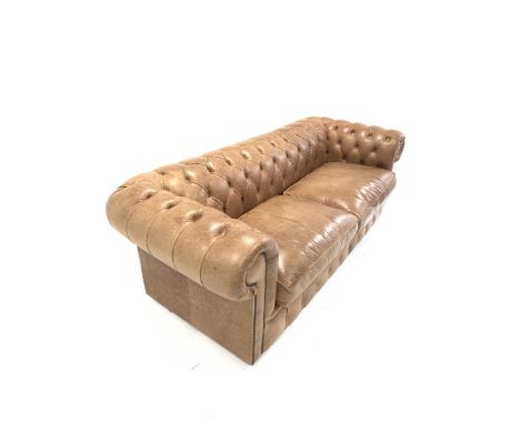 Chesterfield three seat sofa, upholstered in deep buttoned and studded tan leather W213cm