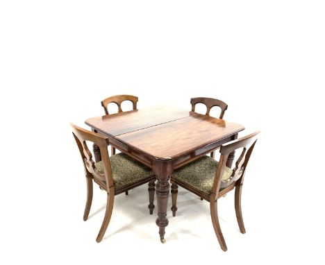 Late Victorian mahogany extending dining table, with two additional leaves, raised on turned supports with brass cup and cera