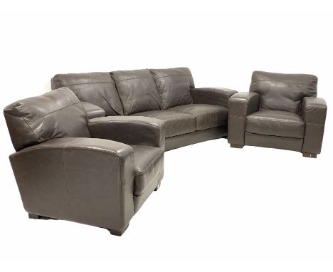 Contemporary three seat sofa, upholstered in brown leather (W218cm) together with a pair of matching armchairs (W90cm)