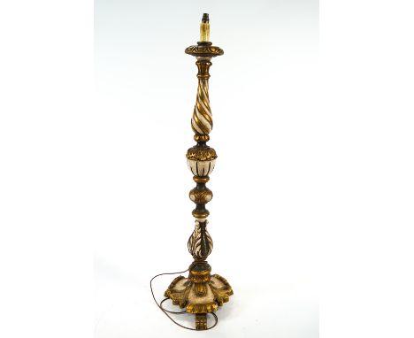 A carved wooden standard lamp base, with foliate details and gilded highlights, height (to top of light fitting) 145cm