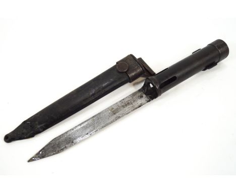 An FN FAL bayonet and scabbard, as used by the Argentine Army in  the Falklands, 32cm long, and an associated plate