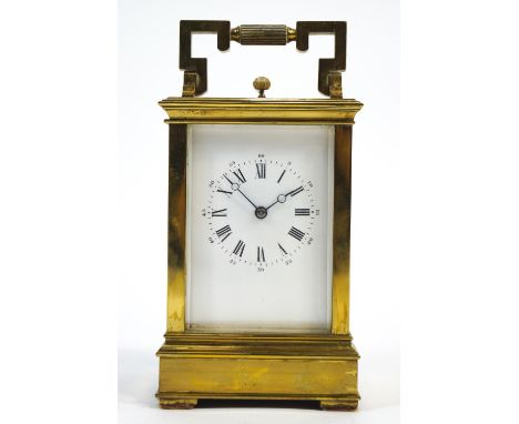 A brass cased five glass repeater carriage clock with fixed Roman dial, striking on a gong, height 17cm
