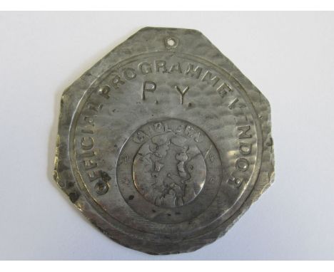 CHELSEA    A metal Chelsea Official Programme Vendor Badge which is believed to be from the 1920's. The item is very slightly