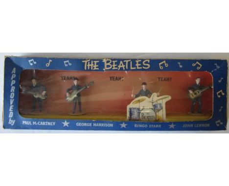 SUBBUTEO / BEATLES  Very scarce item. The Pop Stars in miniature series made by Subbuteo, The Beatles,  four figures, three w