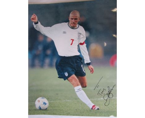 DAVID BECKHAM   Signed colour action photo 20"x24" of David Beckham playing for England.   Good