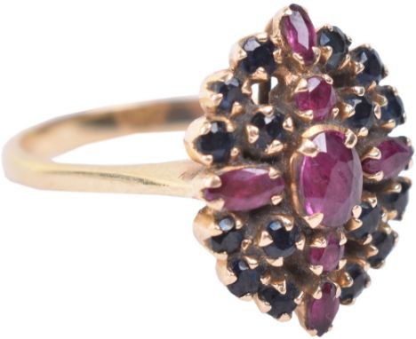 An 18ct gold ruby and sapphire ring, 4.4g