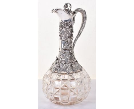 A fine Victorian silver claret jug, by Henry Wilkinson &amp; Co, Birmingham 1880, vine and bunched grape finial, the handle i