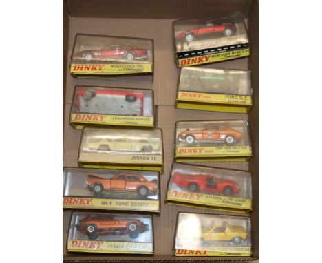 Ten Dinky Toys diecast model vehicles including 131 Jaguar E Type 2+2, 164 mk4 Ford Zodiac, 188 Jensen FF, 189 Lamborghini Ma