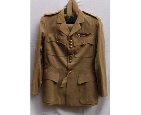 British Army dress uniform jacket with Nemo Me Impune Lacessit brass buttons by Pitt and Co of London and medal ribbons for M