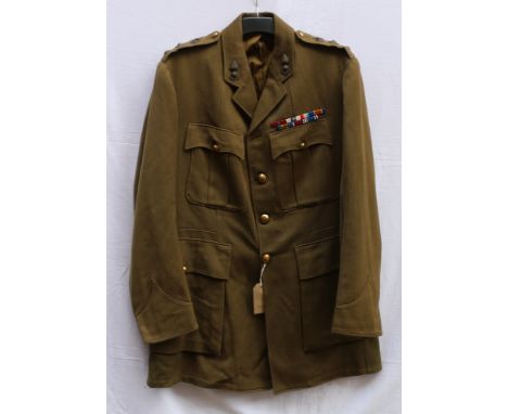 British Army dress uniform khaki green jacket with Hawkes and Co Ltd of London label "Capt Gole C G Findlay 11.11.24" having 