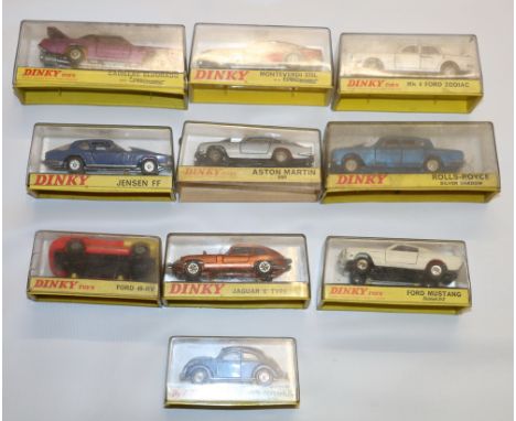 Ten Dinky Toys diecast vehicles including 129 Volkswagen 1300 Sedan, 131 Jaguar E Type 2+2, 132 Ford 40-RV, 153 Aston Martin 