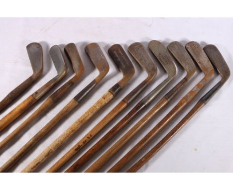 Ten hickory shafted golf clubs, all putters including Hugh Smith of Lossiemouth putting cleek, Hammer Wry Neck putter, R Coll