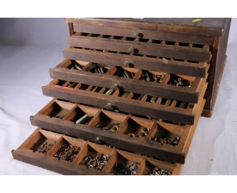 An eight drawer toolmakers chest containing raw materials, hex bar, round bar, tube,&nbsp;taps, dies, safety valve springs, s