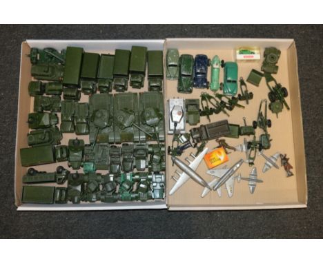 A collection of of over 50 Dinky playworn military and other die-cast model vehicles including three 651 Centurion Tanks, 622