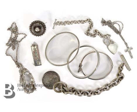 Miscellaneous silver jewellery, including three silver bangles 85.5 gms; silver ingot pendant; silver bangle with heart-form 