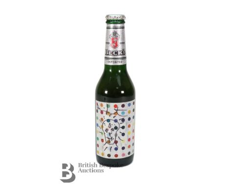 Signed Damien Hirst (b.1965 - ), Becks Beer bottle, offset lithograph 'Opium spot design is signed in ink with a sketch of hi