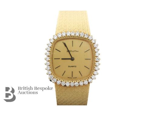 Lady's 18ct yellow gold and diamond Zenith wrist watch. The watch having a 18mm gold face with baton markers, on a solid mesh