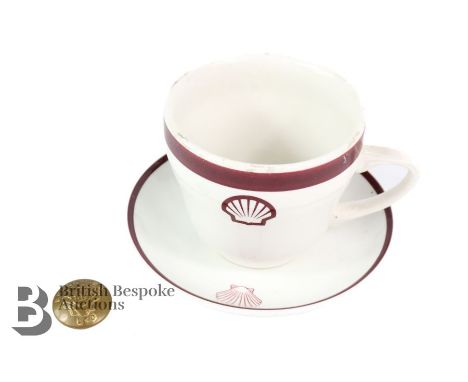 Shell Petroleum advertising cup and saucer, circa 1930s - 1950s, by Sampson Bridgwood, together with a brass Shell Director's