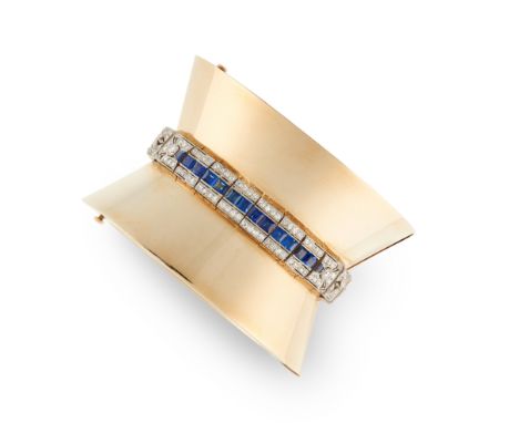 A SAPPHIRE AND DIAMOND CUFF BANGLE in 18ct yellow gold, in tapering cuff design, jewelled with a central bracelet, in Art Dec