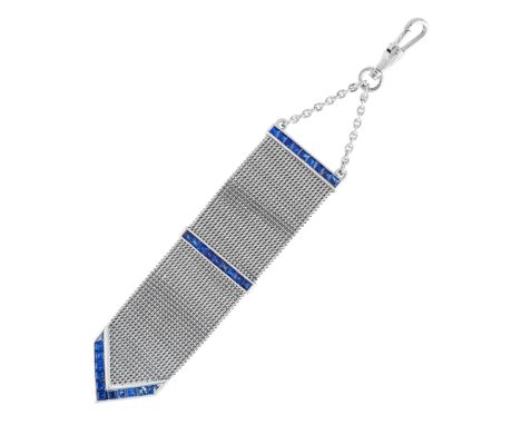 A SAPPHIRE FOB PENDANT set with three rows of step cut sapphires, unmarked, 12cm, 22.5g.