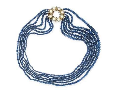 A SAPPHIRE, PEARL AND ENAMEL NECKLACE comprising of six rows of polished sapphire beads, the clasp of circular form, set with