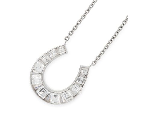 A DIAMOND HORSESHOE PENDANT NECKLACE in platinum, comprising of a horseshoe pendant, set with step cut diamonds totalling app