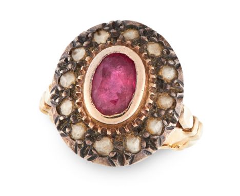 A RUBY AND DIAMOND CLUSTER RING in 18ct yellow gold, in oval form,  set with an oval cut ruby in a cluster of rose cut diamon