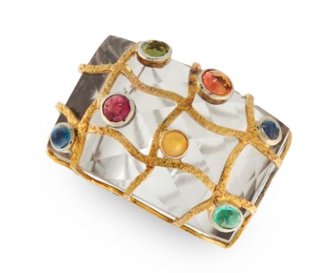 A CARVED ROCK CRYSTAL, SAPPHIRE, EMERALD, OPAL, RUBY AND SMOKEY QUARTZ RING comprising of a carved rock crystal ring, set wit