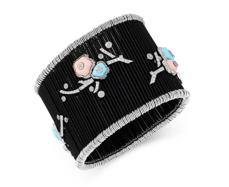 A DIAMOND AND ENAMEL BLOSSOM NECKLACE AND BRACELET SET in 18ct white and black gold, comprising of elasticated black bars, se