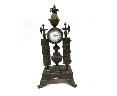 Small bronzed Empire style clock with pineapple finial (crack to enamel dial)