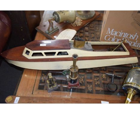 Early 20th Century hardwood model boat, 90 cm long together with a further small methanol engine and attachment (3)