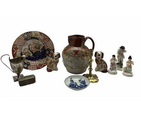 19th century harvest jug H22cm, pair of small Staffordshire spaniels, 18th century brass candlestick, four pieces of dolls ho