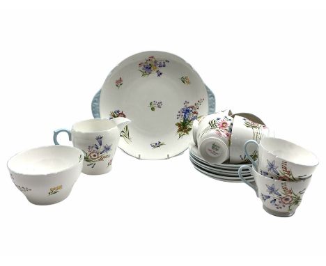 Shelley 'Wild Flowers' pattern part tea service comprising six cups and saucers, bread and butter plate, milk jug and sugar b