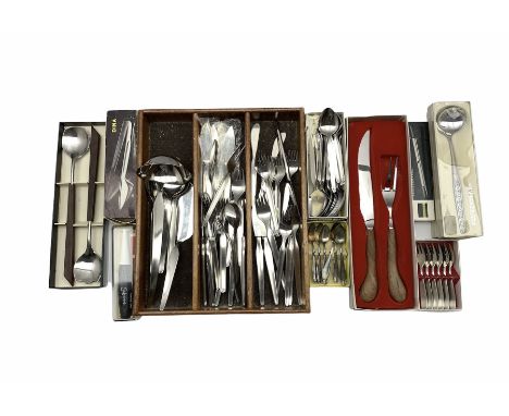 German part service of stainless steel cutlery by Grasoli to include knives and forks, fish knives and forks, spoons, carving