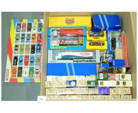 A boxed group of models to include manufacturers such as Bburago, Hot Wheels, Corgi, Lledo and similar. See photo for models.