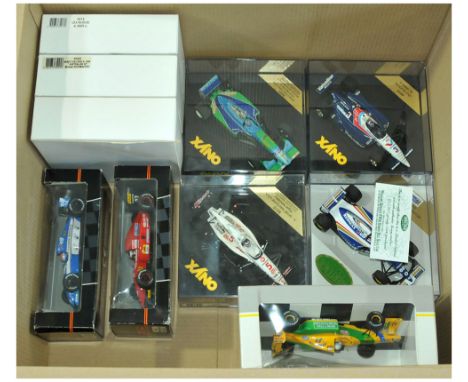 Onyx a boxed Racing Car group to include 5010 K-Mart Havoline Lola 'Nigel Mansell', 5004 Ferrari F92A 'Jean Alesi', 5007 Bene