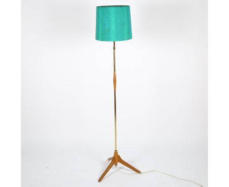 Orsjlo Lighting, a 1950s' oak and brass standard lamp, with adjustable top and original shade, height to fitting 125cmGood co