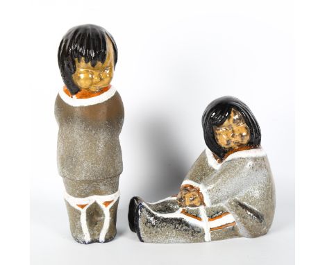 VICKE LINDSTRAND for Uppsala Ekeby, Sweden, a pair of ceramic Innuit figure designed 1947, pattern nr 89 and 90, tallest 33cm