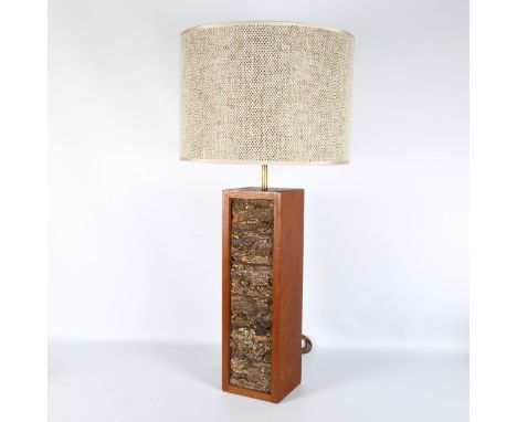 A mid-century teak and cork table lamp, with new hesian shade, overall height 75cmGood overall condition, untested. 