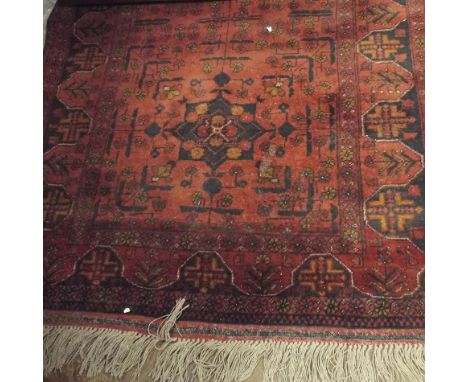 Red and patterned woolpile Persian design rug  Condition - small patch of moth 