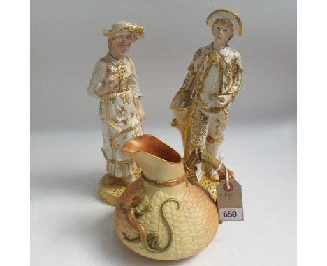 Royal Worcester blush ivory jug of basket design decorated with a lizard 15cm high (a/f) and a pair of Edwardian style figuri