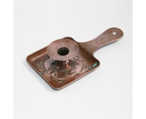 Newlyn copper chamber candlestick embossed with 2 fish, stamped Newlyn to the base 21cm long