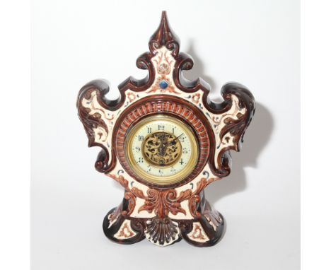 19th century French porcelain cased mantel clock with shell and leaf motif, open brass escapement, complete with pendulum and