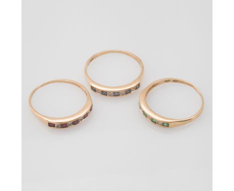 Three matching ladies 18ct gold half hoop rings, each set with ruby & diamond, sapphire & diamond and emerald and diamond. Al