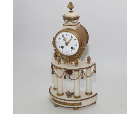 Decorative French alabaster and gilt striking mantel clock standing on a pillar base - 15" high 