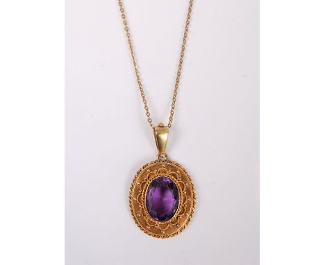 A late 19th century amethyst pendant, the oval amethyst, approx. 1.58cm x 1.15cm, in a collet mount to rope twist and bead bo