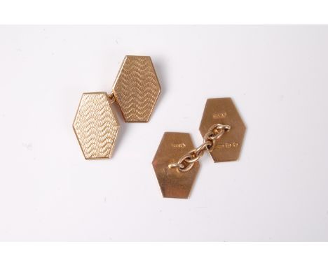 A pair of 9ct cufflinks, the hexagonal engine turned engraved cufflinks hallmarked London 1927, (7.1g)