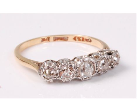 An 18ct five stone diamond ring, the five old brilliant cut diamonds, total estimated approx. 0.40cts, in illusion style whit