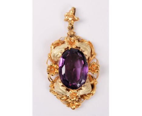 An amethyst pendant, the oval amethyst approx. 2.1x1.4cm, with a stylised foliate surround and hanging bale, all in unmarked 