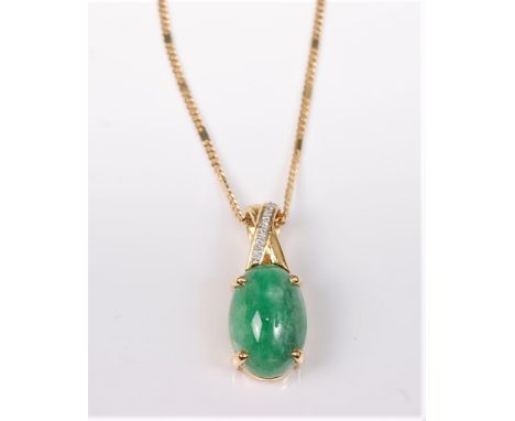 An 18ct jade and diamond pendant, the oval jade cabochon in a four claw mount with an X-shaped hanging bale set with six smal
